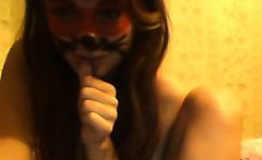 teen with face makeup fingering her wet pussy on webcam