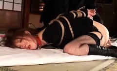 Helpless Asian slut gets fucked with sex toys and chokes on