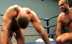 Hunky guy makes his boyfriend do pushups in the ring