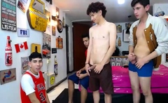 Two randy gay fellas giving blowjobs in group sex action
