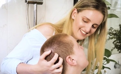 Hairy lesbian redhead gets pleasured in the bathroom